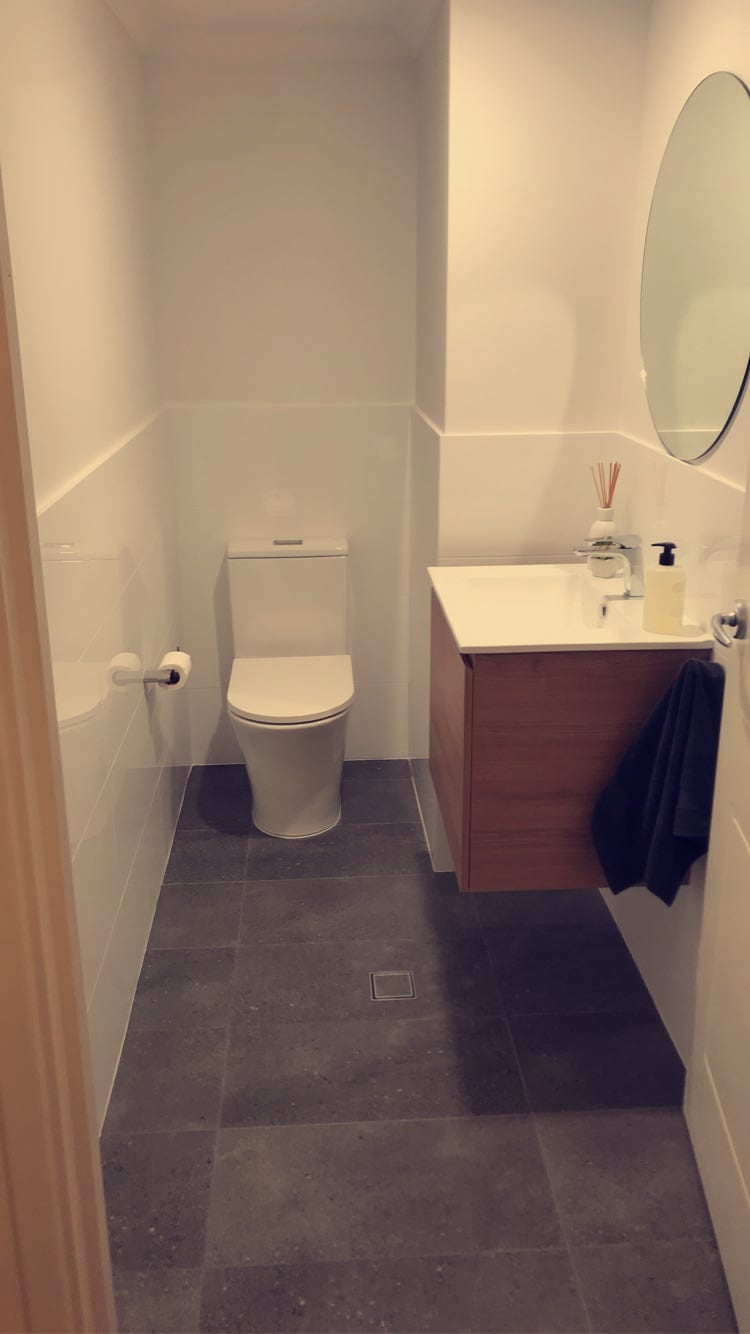 Tidy finished powder room