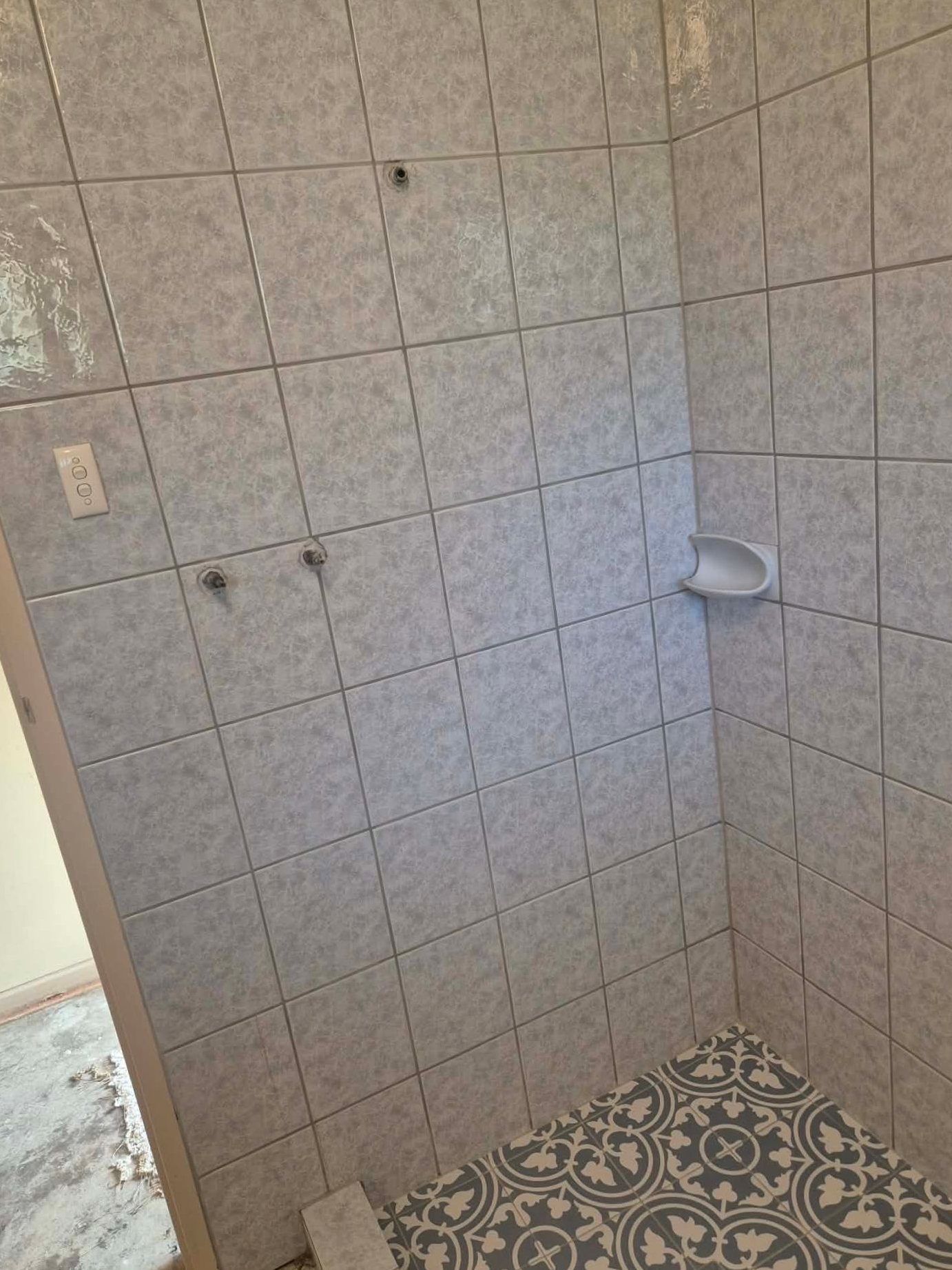 Freshly regrouted shower by Regal Regrout & Tile